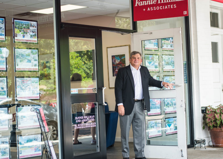 Scott Hillman posed in front of Fannie Hillman + Associates.