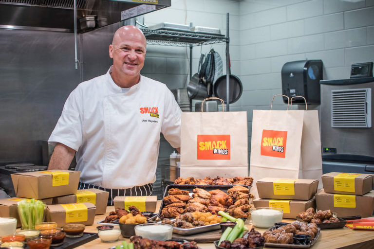 While discussing the new Tijuana Flats "ghost kitchen," Executive Chef Joel Reynders, who grew up in Buffalo, New York, jokes that he was born with a chicken wing in his mouth. Photos by: Abigail Waters